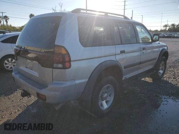 2003 Mitsubishi Montero ES z VIN JA4LS21H13J005577, wystawiony jako Copart lot #41415375 z przebiegiem 171 037 mil mil oraz Szkoda całkowita • Salvage title. Historia ofert i sprzedaży dostępna na DreamBid. Obrazek 3.