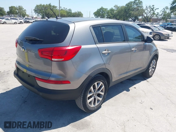 2014 Kia Sportage LX with VIN KNDPB3AC7E7595527, listed as a IAAI auction lot 42062615 with 64,777 mi miles. Bid and sale history available at carsss.com. Image 4.