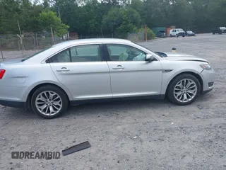 2015 Ford Taurus Limited with VIN 1FAHP2F89FG182598, listed as a IAAI auction lot 42222372 with 124,627 mi miles and . Bid and sale history available at DreamBid. Image 13.