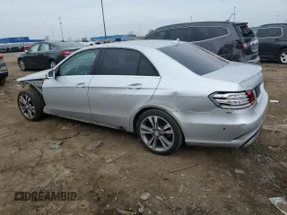 2016 Mercedes-Benz E 350 Sport with VIN WDDHF5KB0GB257791, listed as a Copart auction lot 52527115 with 148,375 mi miles and Salvage Title. Bid and sale history available at DreamBid. Image 2.
