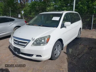 2007 Honda Odyssey EX-L with VIN 5FNRL38707B145049, listed as a IAAI auction lot 42117713 with 76,691 mi miles. Bid and sale history available at carsss.com. Image 2.