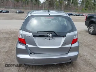 2010 Honda Fit with VIN JHMGE8H26AC001303, listed as a IAAI auction lot 42040111 with 129,949 mi miles. Bid and sale history available at carsss.com. Image 16.