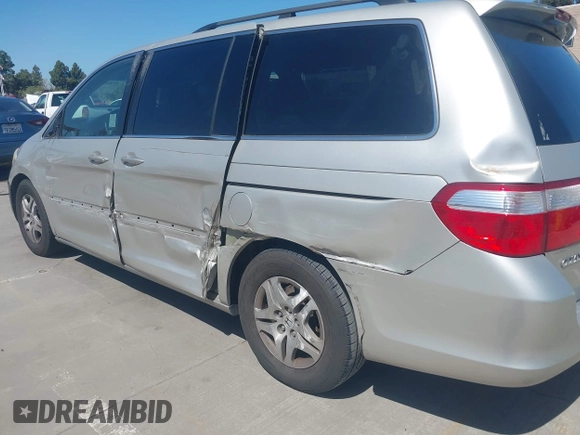 2006 Honda Odyssey EX-L with VIN 5FNRL38766B038599, listed as a IAAI auction lot 41989217 with 164,118 mi miles. Bid and sale history available at carsss.com. Image 6.