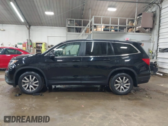 2020 Honda Pilot EX-L z VIN 5FNYF6H58LB061994, wystawiony jako IAAI lot #42358236 z przebiegiem 49 436 mil mil oraz . Historia ofert i sprzedaży dostępna na DreamBid. Obrazek 14.