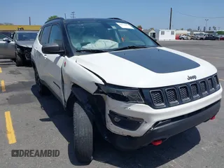 2020 Jeep Compass Trailhawk z VIN 3C4NJDDB5LT248662, wystawiony jako IAAI lot #42574553 z przebiegiem 28 118 mil mil oraz . Historia ofert i sprzedaży dostępna na DreamBid. Obrazek 1.