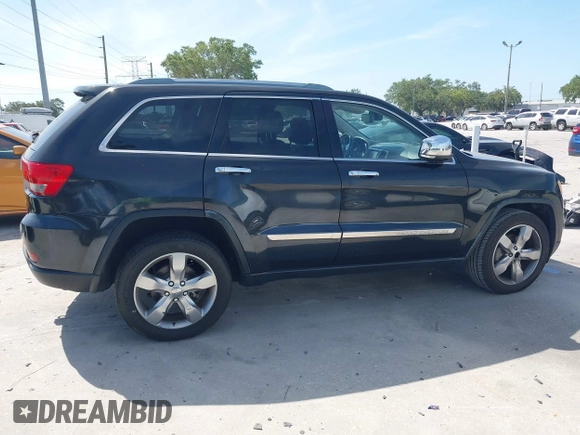 2011 Jeep Grand Cherokee Overland with VIN 1J4RS6GT4BC584029, listed as a IAAI auction lot 42088953 with 144,777 mi miles and . Bid and sale history available at DreamBid. Image 8.
