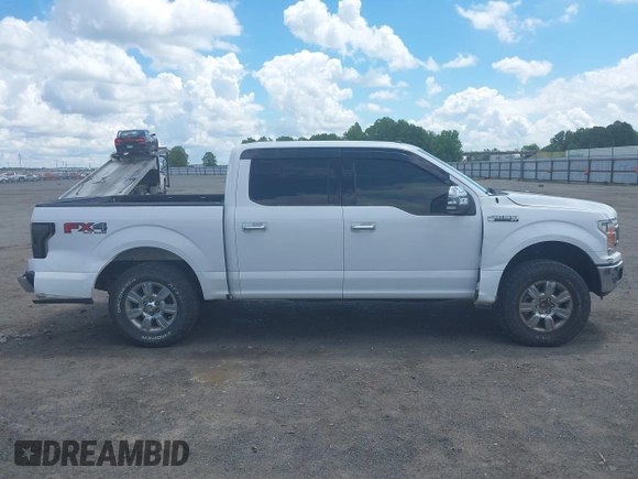 2018 Ford F-150 XL with VIN 1FTEW1E50JKC91068, listed as a IAAI auction lot 42221345 with 135,095 mi miles and . Bid and sale history available at DreamBid. Image 13.