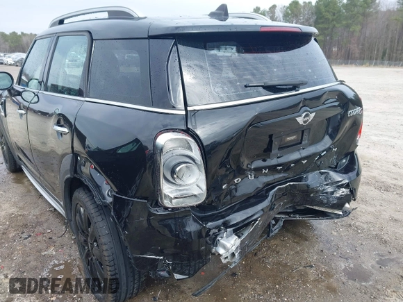 2017 MINI Countryman Cooper S with VIN WMZYT3C34H3D98585, listed as a IAAI auction lot 41752740 with 58,381 mi miles. Bid and sale history available at carsss.com. Image 6.