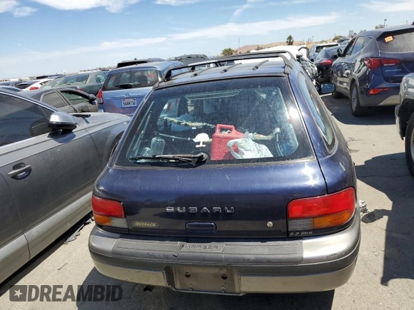 1996 Subaru Impreza Outback with VIN JF1GF4851TG811571, listed as a Copart auction lot 65650514 with 248,315 mi miles and Salvage title. Bid and sale history available at DreamBid. Image 6.