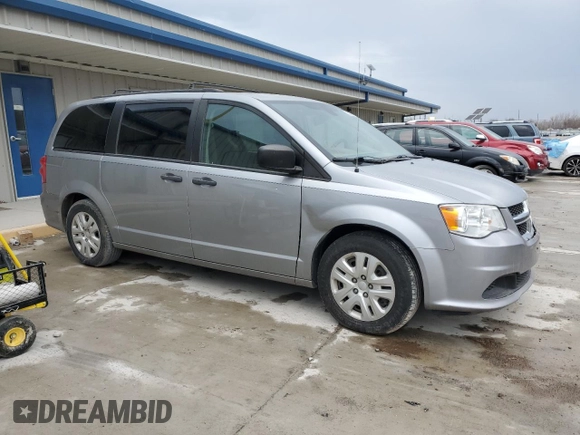 2019 Dodge Grand Caravan SE with VIN 2C4RDGBG2KR777707, listed as a Copart auction lot 46870455 with 129,404 mi miles and Clean Title. Bid and sale history available at DreamBid. Image 4.