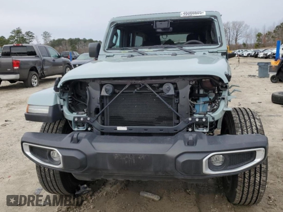 2024 Jeep Wrangler Sahara with VIN 1C4PJXENXRW153777, listed as a Copart auction lot 46066605 with 16,707 mi miles and Salvage Title. Bid and sale history available at DreamBid. Image 5.