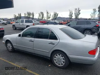 1997 Mercedes-Benz E-Class with VIN WDBJF55FXVJ033553, listed as a IAAI auction lot 41425117 with 280,019 mi miles. Bid and sale history available at carsss.com. Image 13.