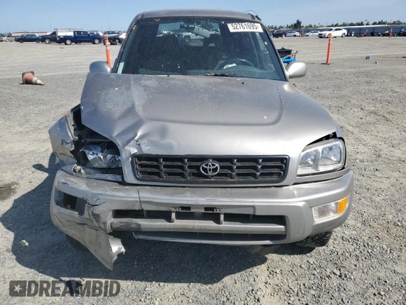 1999 Toyota RAV4 with VIN JT3GP10V5X7053634, listed as a Copart auction lot 52761695 with 236,443 mi miles and Salvage title. Bid and sale history available at DreamBid. Image 5.