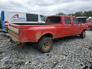 1996 Ford F-350 with VIN 1FTJW35F3TEB59586, listed as a Copart auction lot 79329304 with 199,054 mi miles and Salvage title. Bid and sale history available at DreamBid. Image 3.