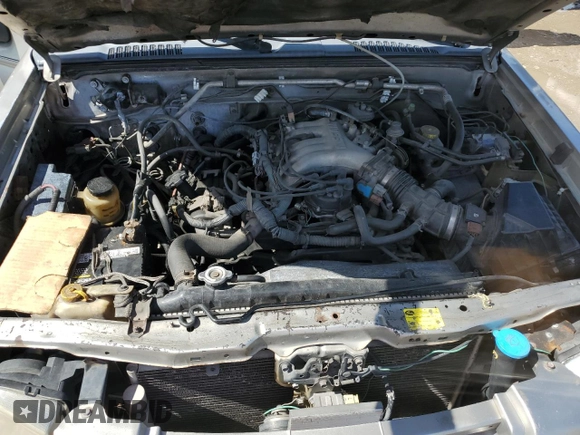 2004 Nissan Frontier XE with VIN 1N6ED29X24C436064, listed as a Copart auction lot 58916434 with 277,026 mi miles and Salvage title. Bid and sale history available at DreamBid. Image 11.