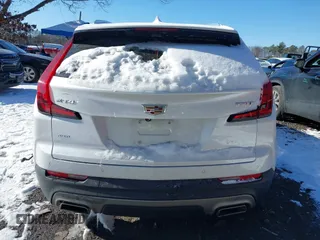 2022 Cadillac XT4 AWD Premium Luxury with VIN 1GYFZDR4XNF139337, listed as a IAAI auction lot 41326816 with 26,823 mi miles and . Bid and sale history available at carsss.com. Image 16.