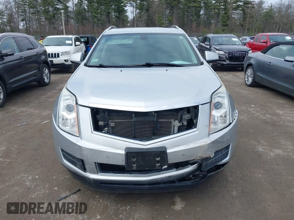 2014 Cadillac SRX Luxury Collection z VIN 3GYFNEE33ES670356, wystawiony jako IAAI lot #42008087 z przebiegiem 59 953 mil mil oraz . Historia ofert i sprzedaży dostępna na DreamBid. Obrazek 6.