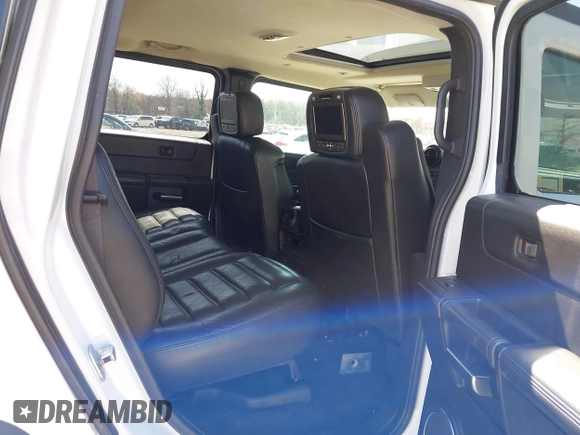 2006 Hummer H2 with VIN 5GRGN23U86H104660, listed as a IAAI auction lot 41933116 with 165,734 mi miles. Bid and sale history available at carsss.com. Image 8.