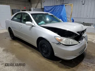2003 Toyota Camry LE with VIN 4T1BE32KX3U158221, listed as a Copart auction lot 52087875 with 201,020 mi miles and Salvage Title. Bid and sale history available at DreamBid. Image 4.