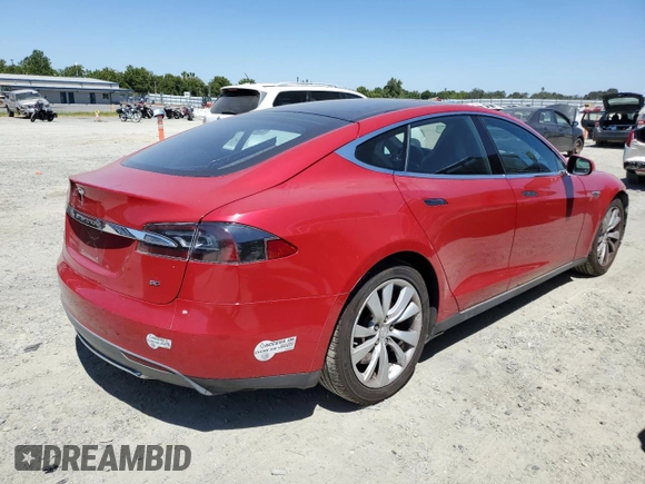 2014 Tesla Model S 60 with VIN 5YJSA1H17EFP64266, listed as a Copart auction lot 61678485 with 104,160 mi miles and Salvage title. Bid and sale history available at DreamBid. Image 3.