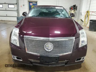 2009 Cadillac CTS AWD z VIN 1G6DT57V990136974, wystawiony jako Copart lot #50154525 z przebiegiem 196 934 mil mil oraz Szkody całkowita. Historia ofert i sprzedaży dostępna na DreamBid. Obrazek 5.