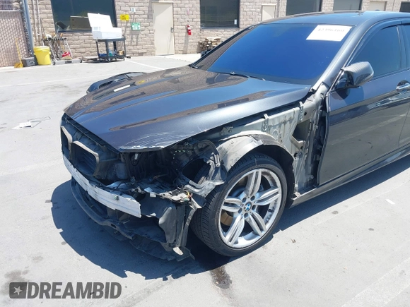 2014 BMW 5 Series 535i with VIN WBA5B1C51ED479359, listed as a IAAI auction lot 42396160 with 149,522 mi miles and . Bid and sale history available at DreamBid. Image 6.