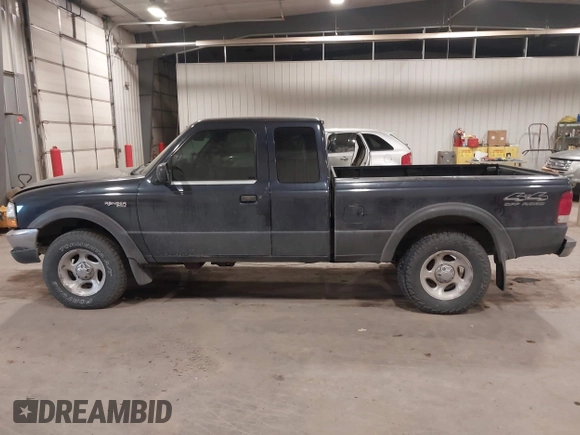2000 Ford Ranger XLT with VIN 1FTZR15X2YPB86720, listed as a IAAI auction lot 41501141 with 211,794 mi miles. Bid and sale history available at carsss.com. Image 14.