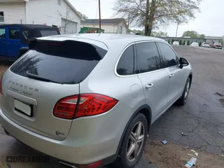 2012 Porsche Cayenne S Hybrid with VIN WP1AE2A2XCLA90082, listed as a IAAI auction lot 41960714 with 139,081 mi miles. Bid and sale history available at carsss.com. Image 4.