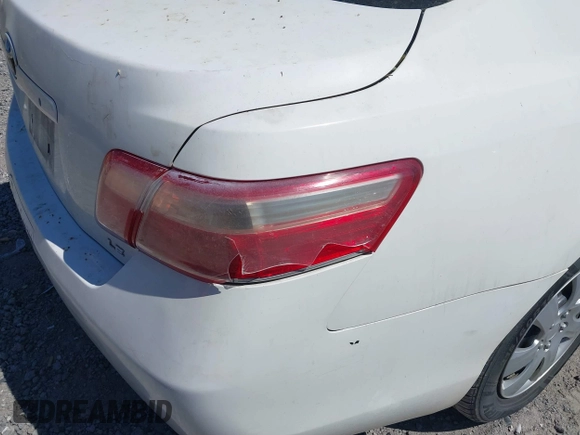 2007 Toyota Camry CE with VIN 4T1BE46KX7U675489, listed as a IAAI auction lot 41901818 with 203,335 mi miles. Bid and sale history available at carsss.com. Image 6.