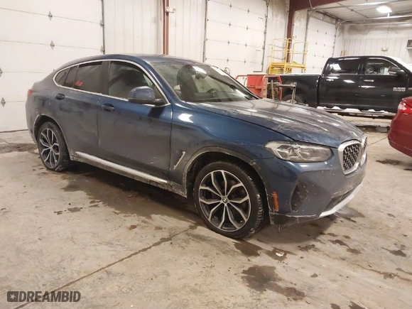 2023 BMW X4 xDrive30i with VIN 5UX33DT01P9R31277, listed as a IAAI auction lot 41618617 with 23,952 mi miles. Bid and sale history available at carsss.com. Image 1.