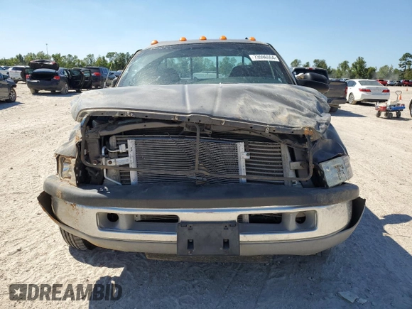 2002 Dodge Ram 2500 with VIN 3B7KC23C52M271394, listed as a Copart auction lot 73596554 with 0 mi miles and Salvage Title. Bid and sale history available at carsss.com. Image 5.