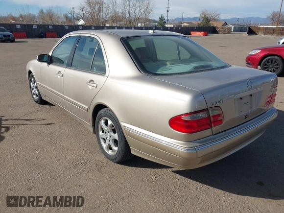 2002 Mercedes-Benz E-Class with VIN WDBJF65J92B479841, listed as a IAAI auction lot 41471955 with 203,527 mi miles. Bid and sale history available at carsss.com. Image 3.