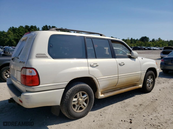 1999 Lexus LX 470 Luxury SUV with VIN JT6HT00W2X0040242, listed as a Copart auction lot 70143944 with NaN miles and Clean Title. Bid and sale history available at carsss.com. Image 3.