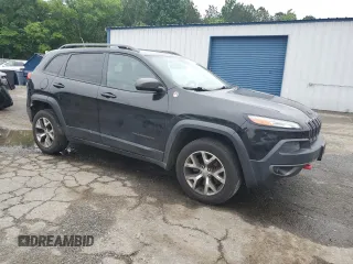 2014 Jeep Cherokee Trailhawk with VIN 1C4PJMBS6EW211385, listed as a Copart auction lot 55923255 with 162,753 mi miles and Clean title. Bid and sale history available at DreamBid. Image 4.
