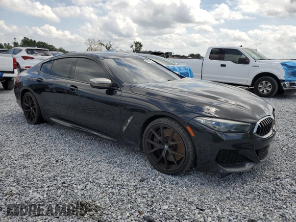 2020 BMW 8 Series M850i z VIN WBAGV8C06LBP48901, wystawiony jako Copart lot #57595725 z przebiegiem 88 332 mil mil oraz Czysty tytuł • Clean title. Historia ofert i sprzedaży dostępna na DreamBid. Obrazek 4.