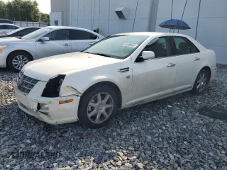 2011 Cadillac STS z VIN 1G6DU6EDXB0110063, wystawiony jako Copart lot #58990865 z przebiegiem 134 384 mil mil oraz Szkoda całkowita • Salvage title. Historia ofert i sprzedaży dostępna na DreamBid. Obrazek 1.