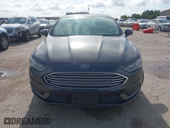 2017 Ford Fusion Hybrid SE with VIN 3FA6P0LU5HR336779, listed as a IAAI auction lot 42691789 with 140,720 mi miles and . Bid and sale history available at DreamBid. Image 12.