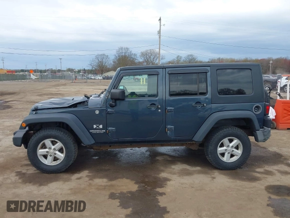 2007 Jeep Wrangler Unlimited X with VIN 1J4GA39137L101321, listed as a IAAI auction lot 42095445 with 243,583 mi miles and . Bid and sale history available at DreamBid. Image 14.