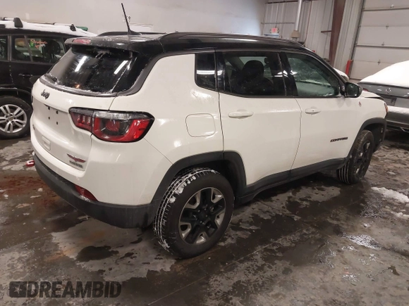 2018 Jeep Compass Trailhawk with VIN 3C4NJDDB2JT328269, listed as a IAAI auction lot 41597957 with 66,789 mi miles and . Bid and sale history available at carsss.com. Image 4.