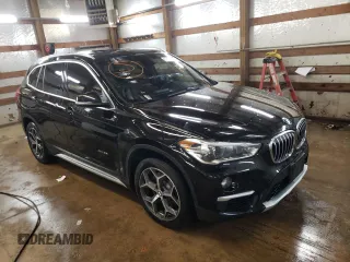 2017 BMW X1 xDrive28i with VIN WBXHT3C34H5F87048, listed as a Copart auction lot 67545012 with 76,666 mi miles. Bid and sale history available at carsss.com. Image 4.