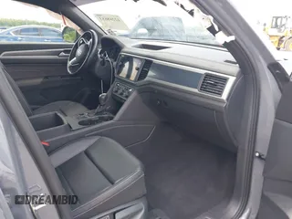 2021 Volkswagen Atlas SE with VIN 1V2PE2CA2MC207444, listed as a IAAI auction lot 42268653 with 70,202 mi miles and . Bid and sale history available at DreamBid. Image 5.