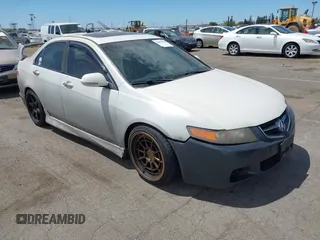 2006 Acura TSX Navi with VIN JH4CL96926C032565, listed as a IAAI auction lot 42813048 with 203,670 mi miles and . Bid and sale history available at DreamBid. Image 1.