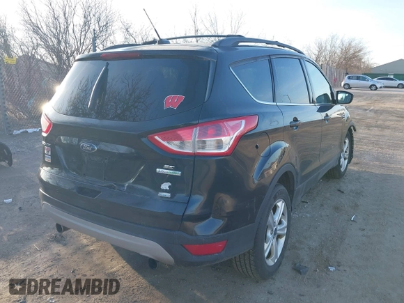 2013 Ford Escape SE with VIN 1FMCU0G94DUB53061, listed as a IAAI auction lot 41781462 with 220,915 mi miles. Bid and sale history available at carsss.com. Image 4.