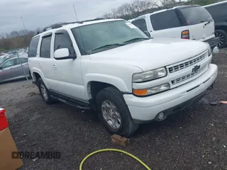 2005 Chevrolet Tahoe Z71 z VIN 1GNEK13T85R128427, wystawiony jako IAAI lot #41809890 z przebiegiem 239 414 mil mil oraz . Historia ofert i sprzedaży dostępna na DreamBid. Obrazek 1.