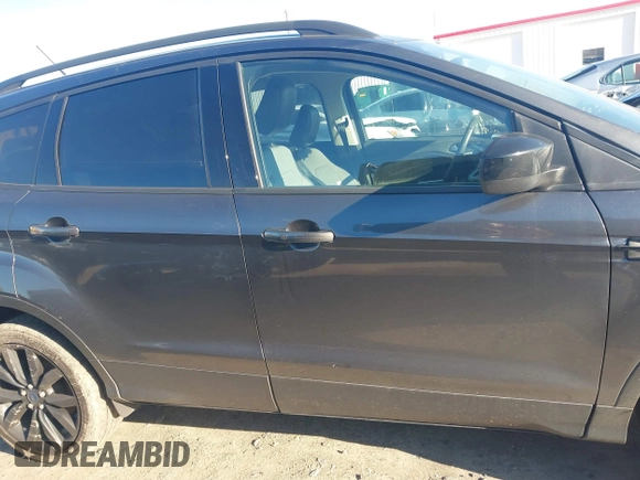 2019 Ford Escape SE z VIN 1FMCU0GD4KUA91551, wystawiony jako IAAI lot #41590151 z przebiegiem Nie podano mil oraz . Historia ofert i sprzedaży dostępna na DreamBid. Obrazek 14.