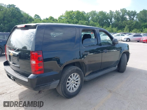 2010 Chevrolet Tahoe LS with VIN 1GNMCAE00AR175361, listed as a IAAI auction lot 42573822 with 188,700 mi miles and . Bid and sale history available at DreamBid. Image 4.