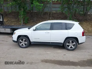 2016 Jeep Compass High Altitude with VIN 1C4NJDEB0GD546305, listed as a IAAI auction lot 42371770 with 158,486 mi miles and . Bid and sale history available at DreamBid. Image 14.