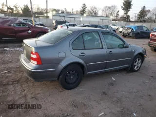 2004 Volkswagen Jetta GL with VIN 3VWRK69M74M002287, listed as a Copart auction lot 46682325 with 104,970 mi miles and Salvage title. Bid and sale history available at DreamBid. Image 3.