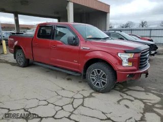2015 Ford F-150 XLT w/HD Payload Pkg with VIN 1FTFW1EG9FFA35744, listed as a Copart auction lot 51133275 with 128,006 mi miles and Salvage Title. Bid and sale history available at carsss.com. Image 4.
