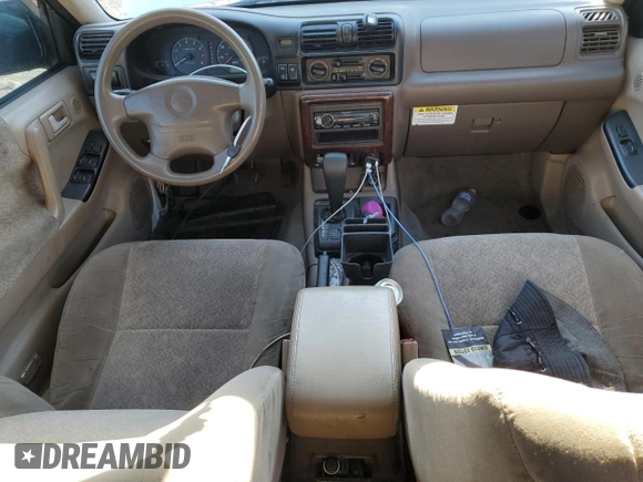 2001 Isuzu Rodeo S with VIN 4S2CK58W414338481, listed as a Copart auction lot 80849314 with 109,036 mi miles and Salvage Title. Bid and sale history available at DreamBid. Image 8.